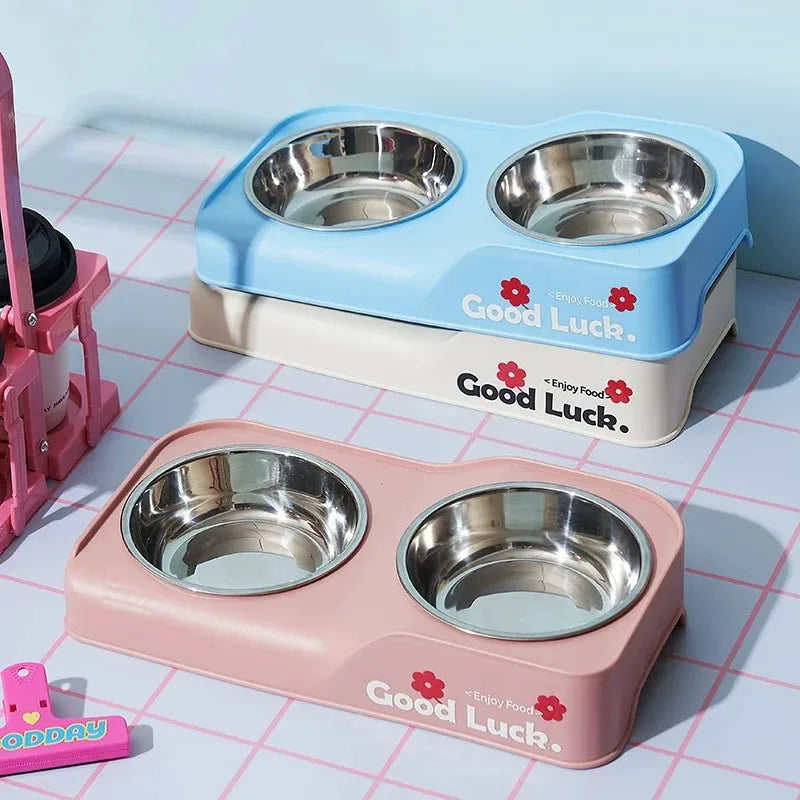 Stainless steel double-bowl elevated pet feeding bowl with non-slip foldable stand suitable for small to medium dogs and cats